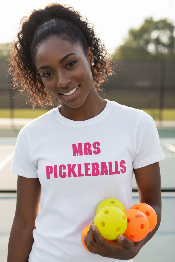 Woman wearing MRS PICKLEBALLS tee holding pickleballs
