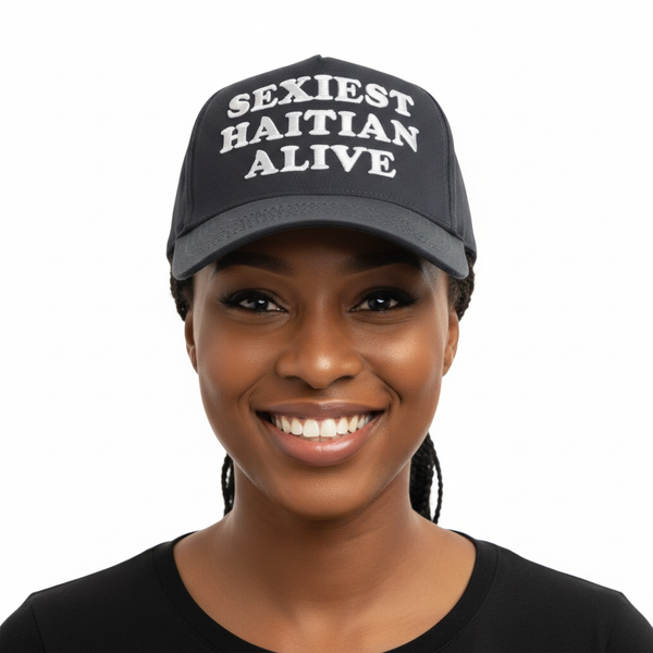 Haitian woman wearing Sexiest Haitian Alive cap