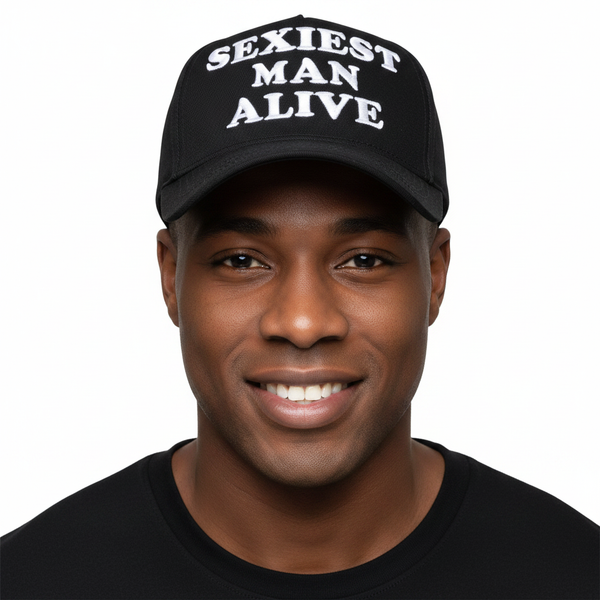 Dark-skinned man wearing Sexiest Man Alive cap