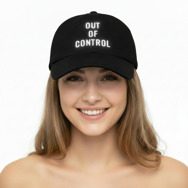 Cute girl wearing Out Of Control cap with bright vivid white text